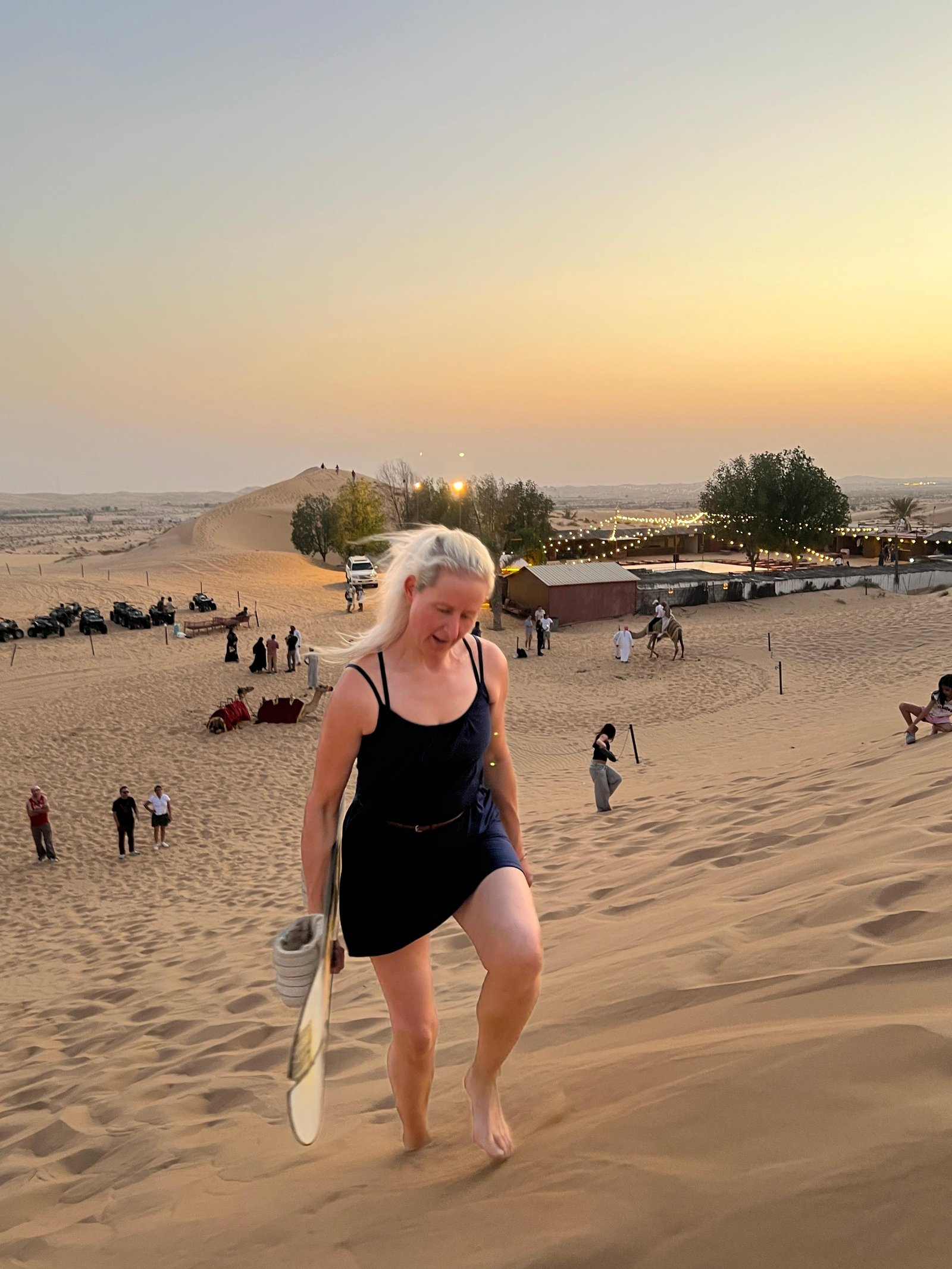 Best time for an Abu Dhabi desert safari — golden sunset over the Al Khatim dunes